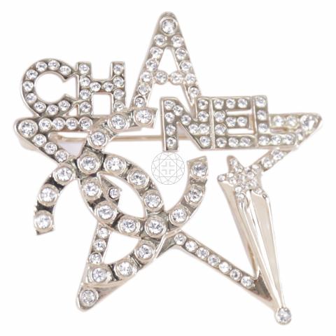 Chanel star store brooch